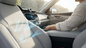 Ventilated car seat with air circulation cooling system in action during summer driving