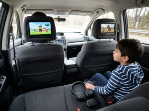 Dual 7 inch touchscreen headrest monitors installed front seats with wireless headphones